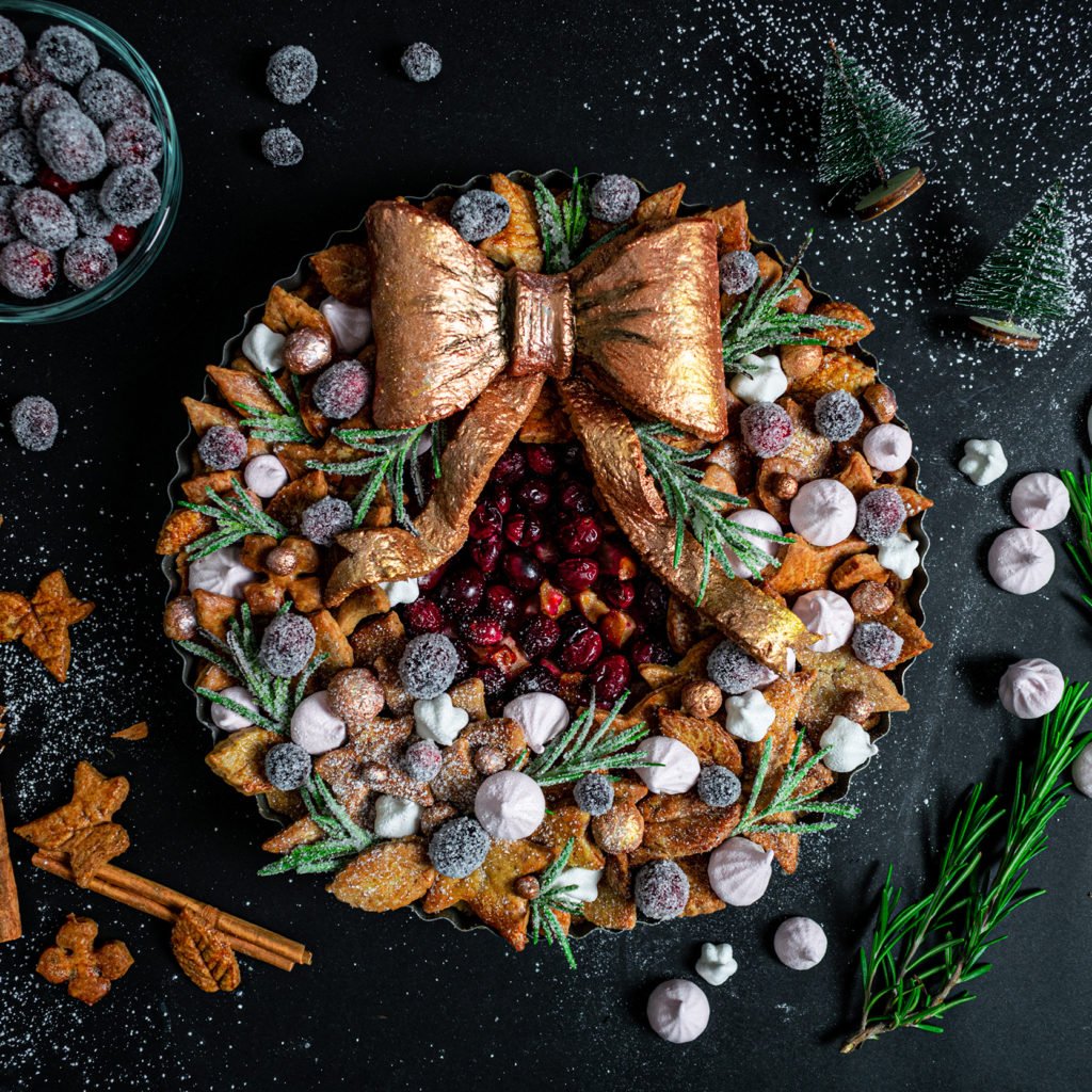 Cranberry wreath cake with large edible bow