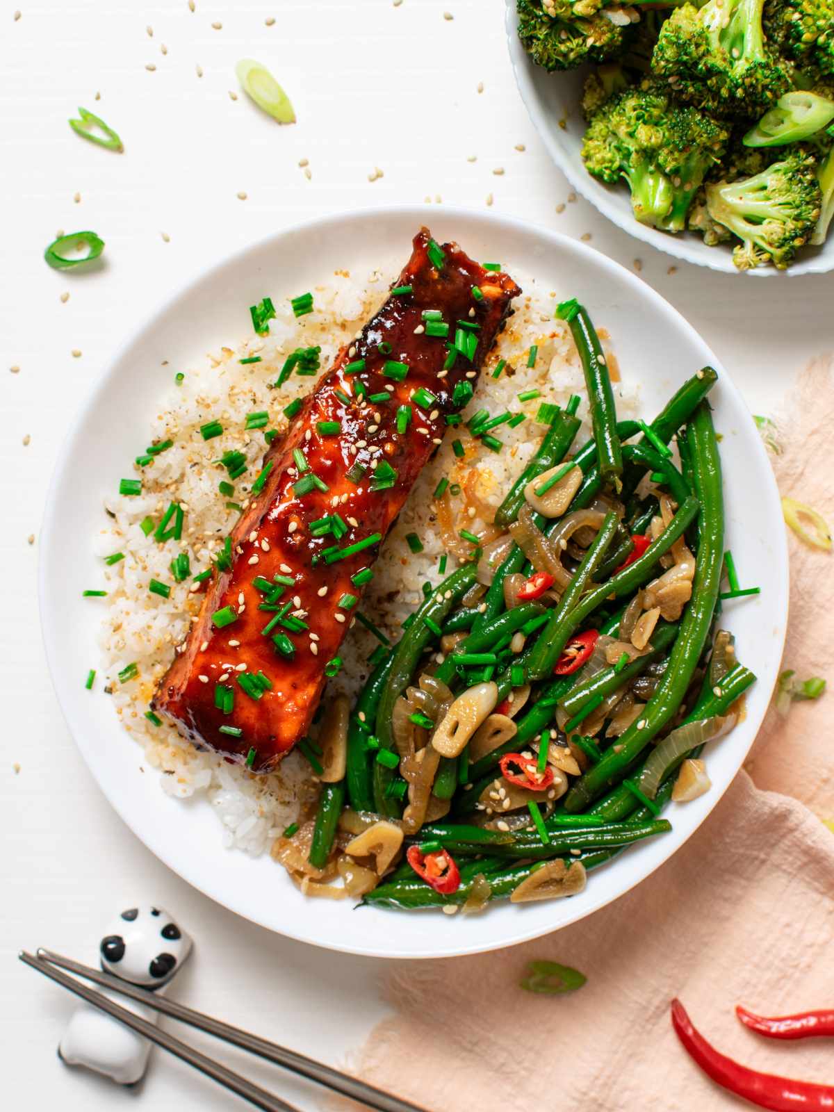 Gochujang salmon on rice with green beans and broccoli on the side