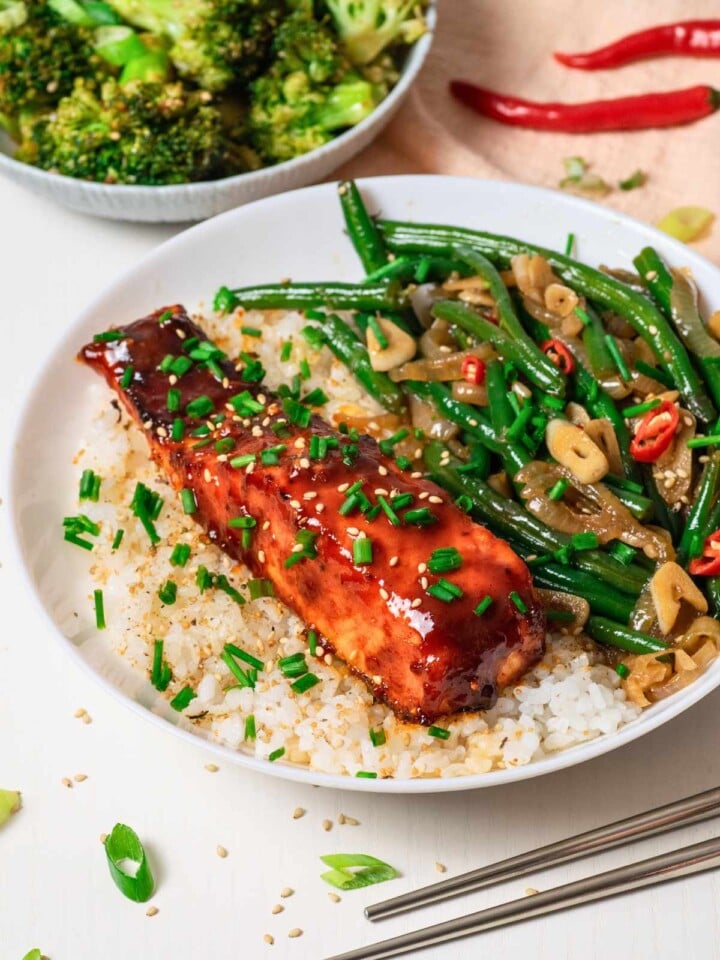 Gochujang salmon on rice with green beans and broccoli on the side