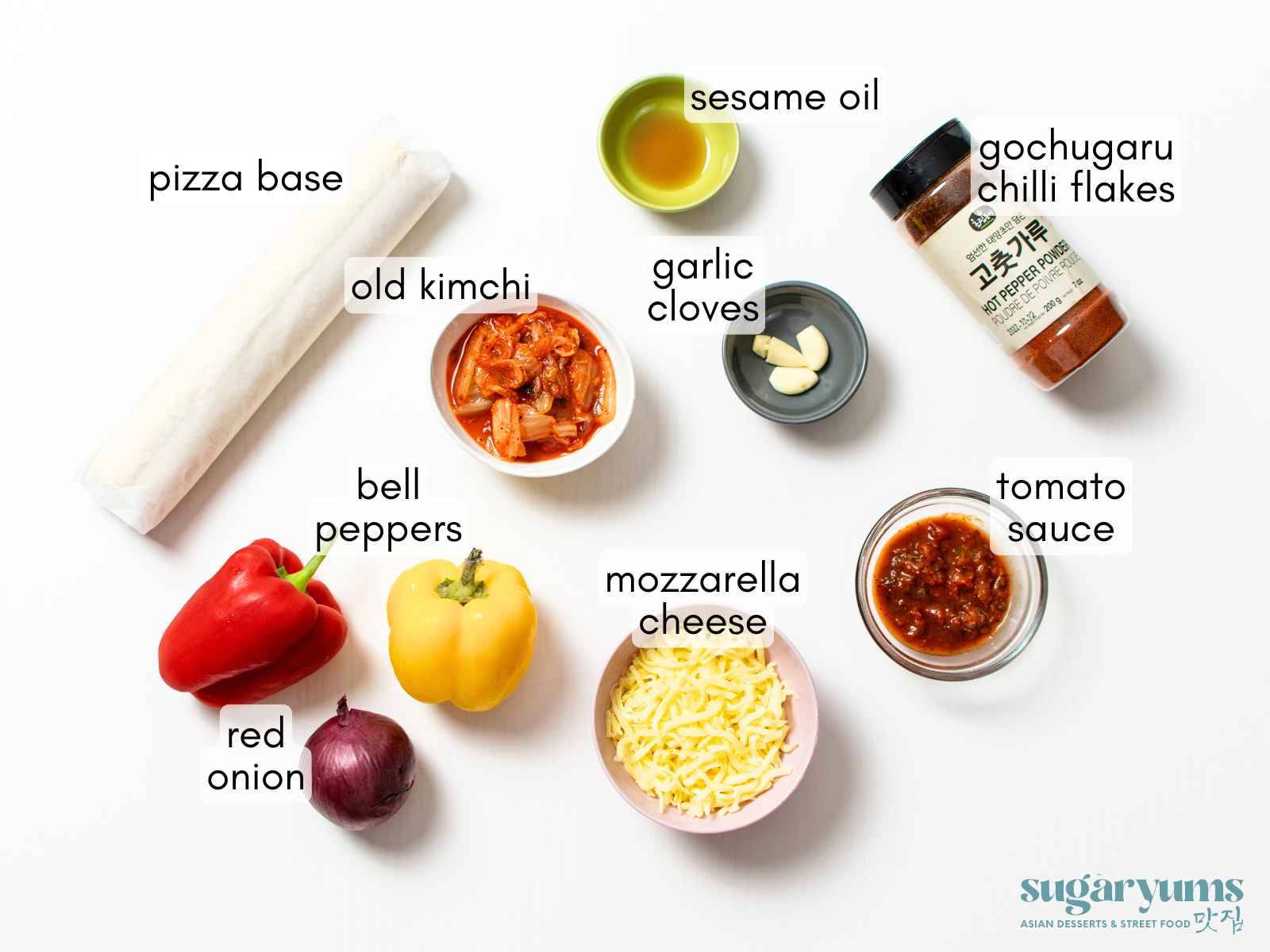 ingredients in bowls and plates on white background